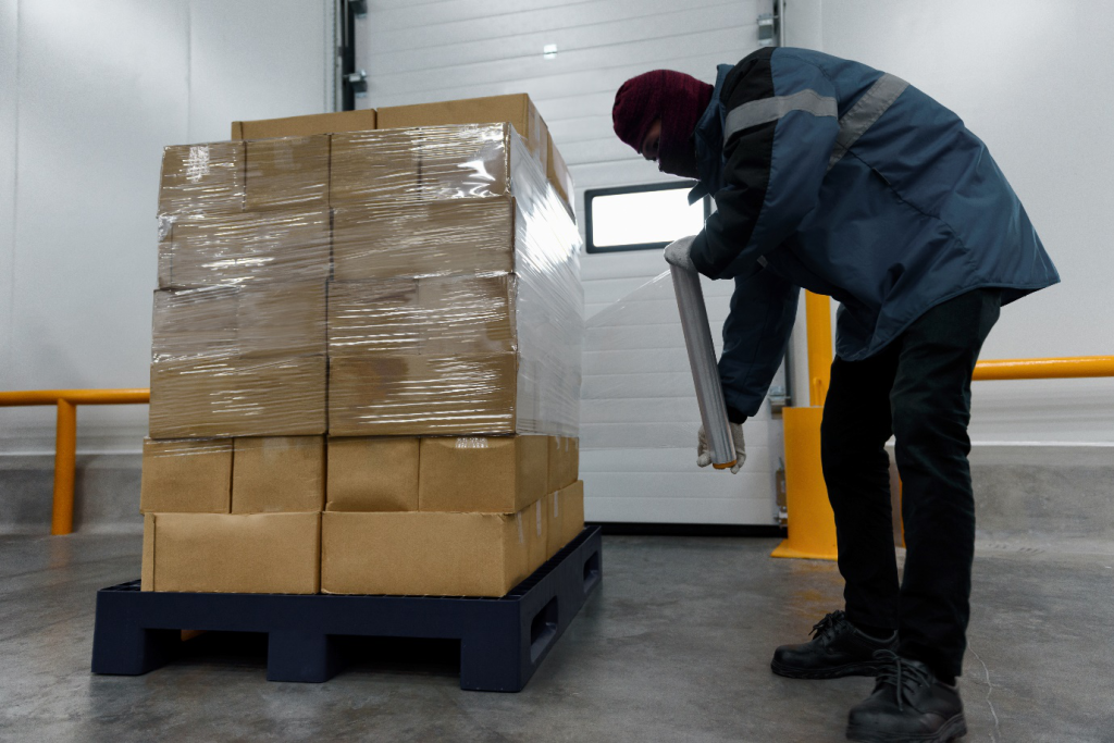 A worker in a cold storage unit