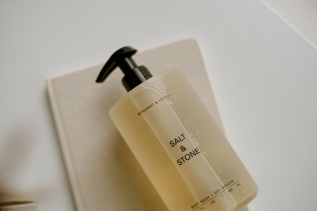 a-bottle-of-soap-sitting-on-top-of-a-soap-dispenser