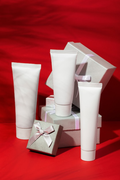 white tubes on a red table