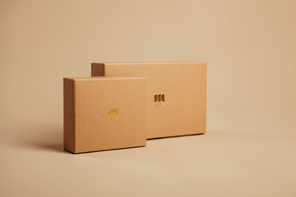A couple of cardboard boxes used in customized packaging solutions