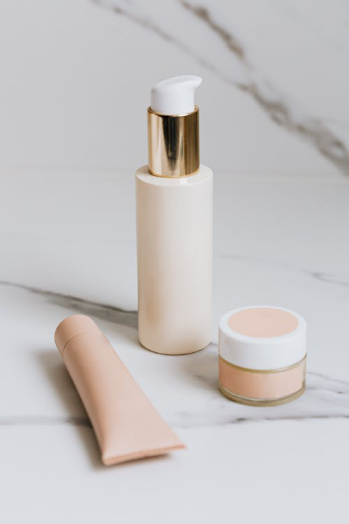 Assortment of packaged cosmetics in elegant tube packaging