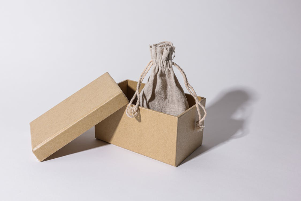 A brown bag in a brown box.