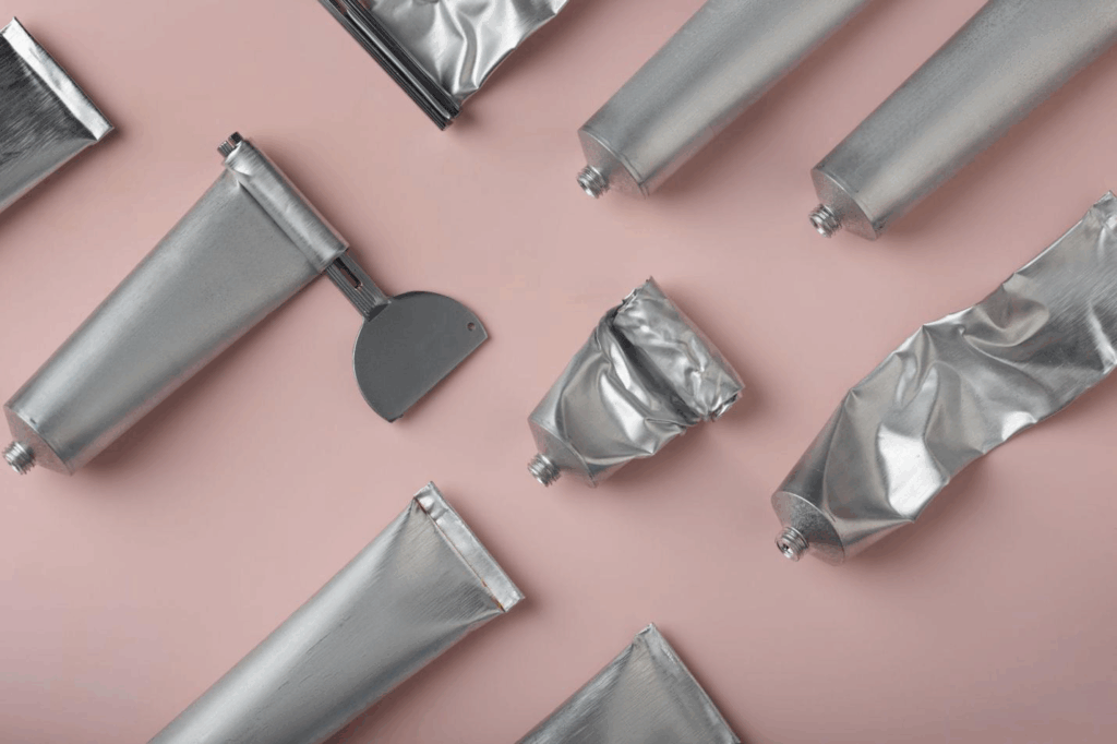 Various aluminum tubes representing different types of products.