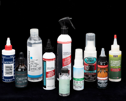 Several bottles laid out together.
