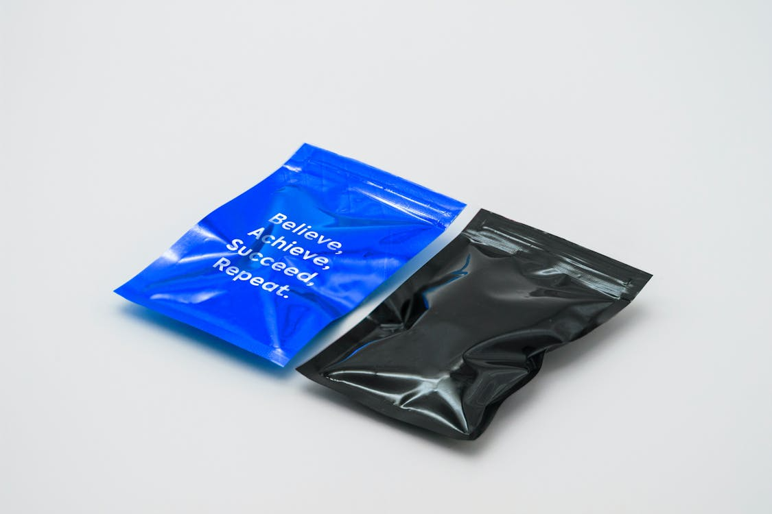 Two packets of product on a white background.