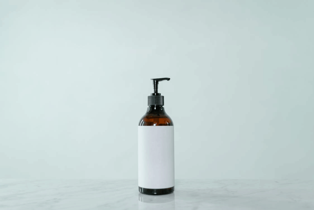 A packaged bottle product with a plain label